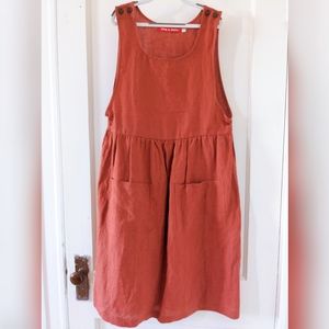 Pyne & Smith pinafore in Devon Red model 33